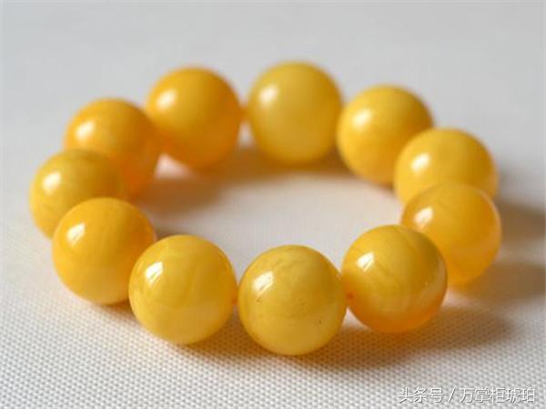 蜜蜡鸡油红好还是鸡油黄好,鉴别鸡油黄蜜蜡真假的最简单方法