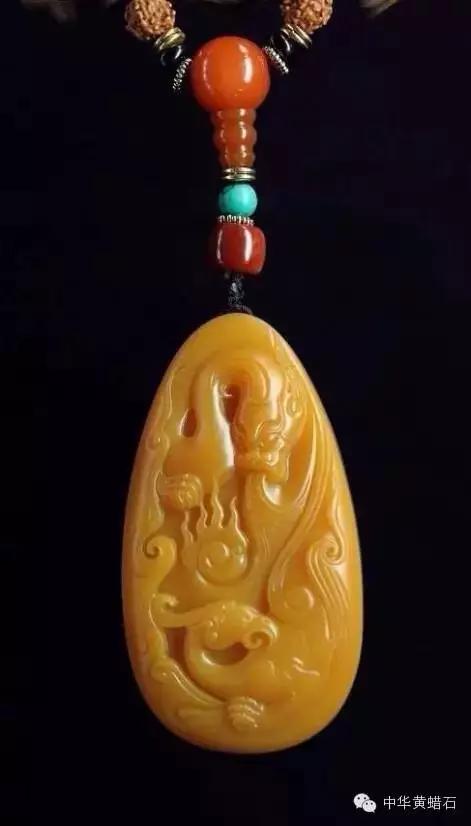 顶级的黄蜡石与和田玉的区别,老干皮顶级黄蜡石原石图片